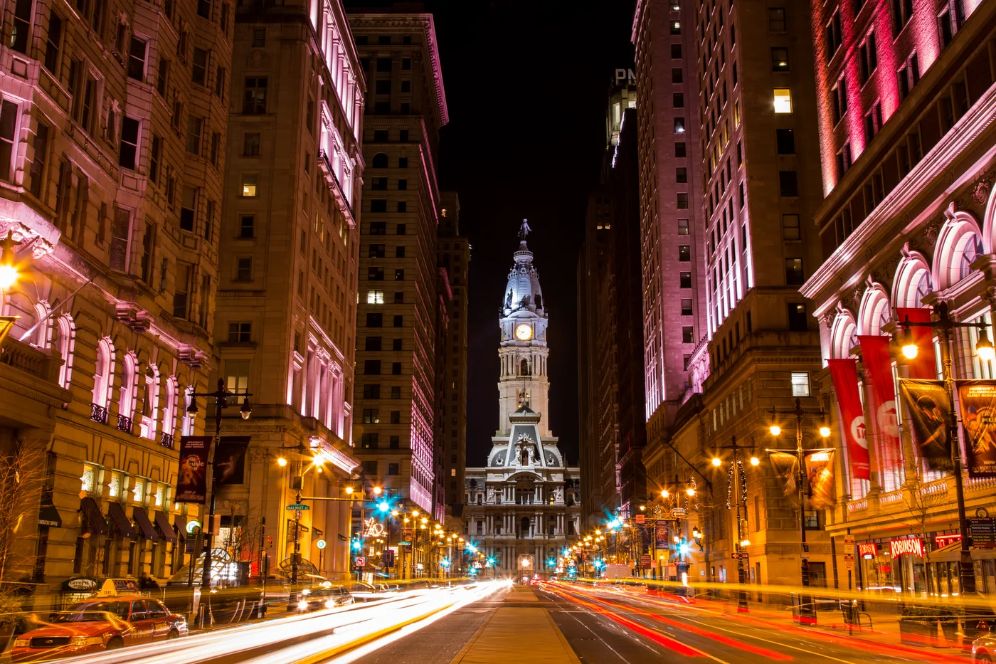 Philadelphia City Hall illuminated at night, viewed from Broad Street